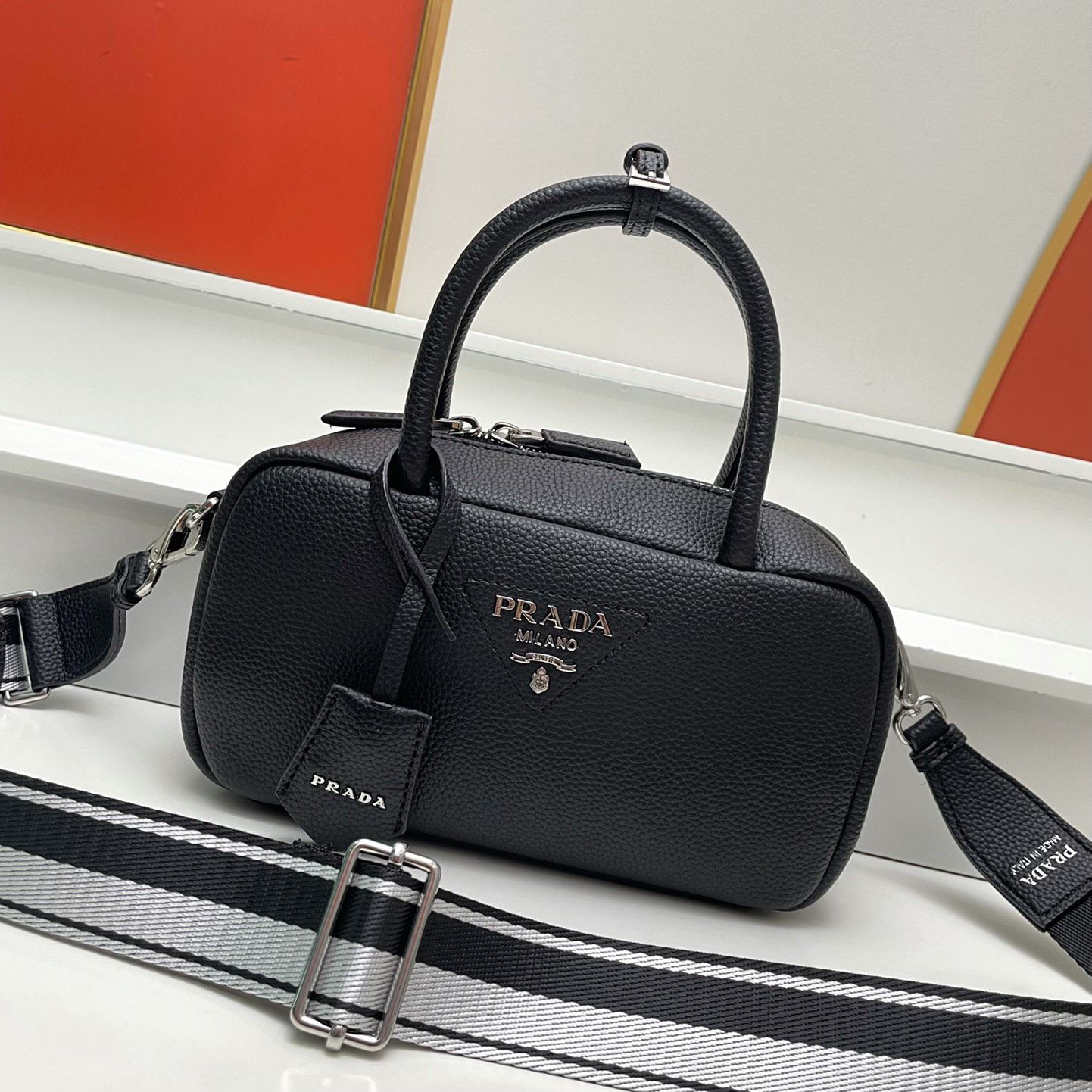 Pra*a top handle bags